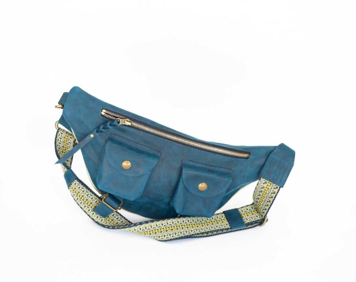 Picture of the colbat blue travel back with yellow-navy strap.