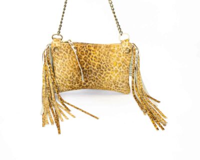 Close-up of a tan leopard print handbag.