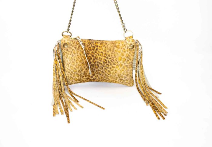 Close-up of a tan leopard print handbag.