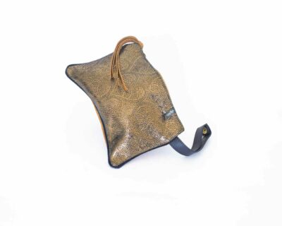 Picture of the front of the coin purse in paisley leather.